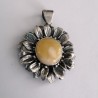 Sunflower-shaped pendant with decorative silver leaves
