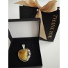 Unique pendant with small rose and natural amber. Set in 925 ster