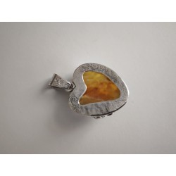 Unique pendant with small rose and natural amber. Set in 925 ster