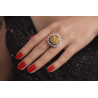 Ring with amber and unique pattern on silver setting