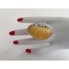 Unique ring with elongated amber and exceptional silver bead sett