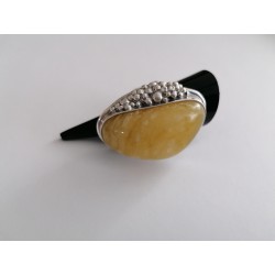 Unique ring with elongated amber and exceptional silver bead sett
