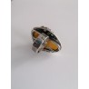 Unique ring with elongated amber and exceptional silver bead sett